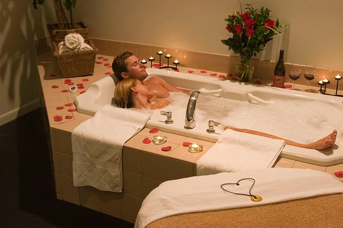 60 min Couple's Massage to choose and 30 min Floral Bath at THAI SPA MASSAGE - The private couples set-up: two Thai stretchers, two masseurs