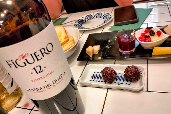 A Taste of Catalan Elegance: Private Wine Tasting in Barcelona - Joan’s Wine Bar: Four High-End Wines, Cheese, and Homemade Chocolate