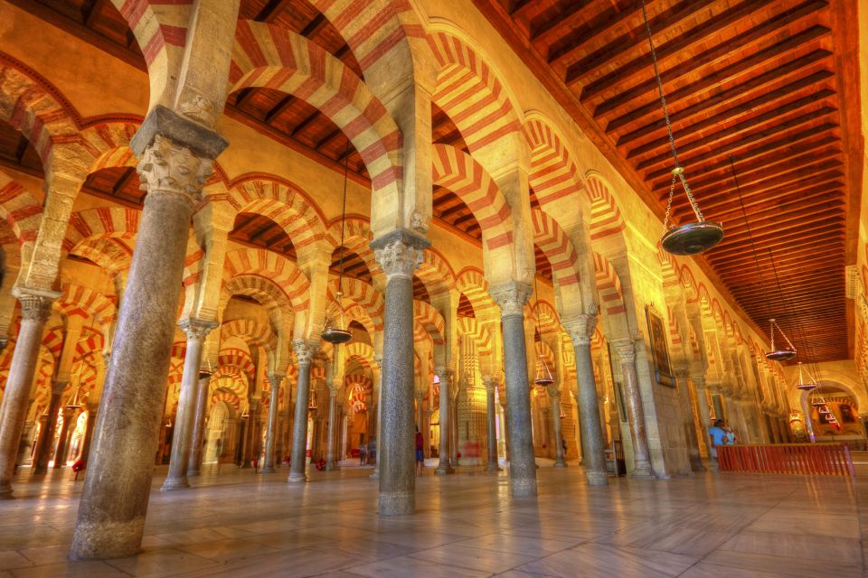 Andalusia and Barcelona 7-Day Package Tour From Madrid - Day 1: Madrid to Cordoba’s Mezquita and Seville’s Macarena stay