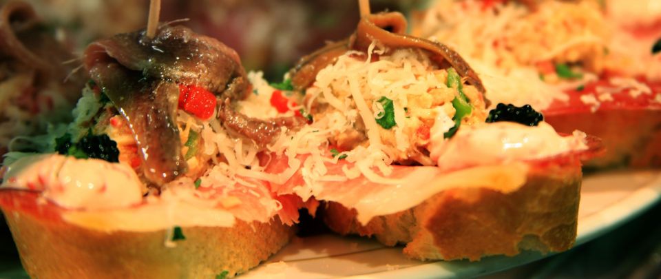 Barcelona: 4-Hour Private Market & Foodie Tour - Mediterranean tapas and paired drinks: where the flavor map clicks