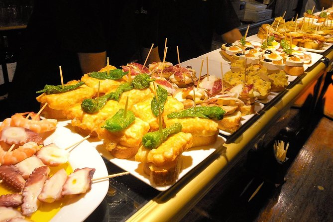 Barcelona Art and Tapas Small Group Walking Tour with Picasso Museum - What You Eat and Drink: Pintxos, Fried Seafood, Bravas, and Dessert