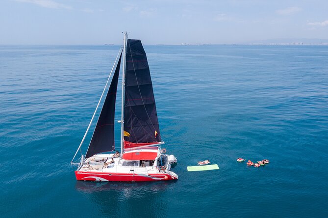 Barcelona Catamaran Cruise with Tapa & Drink Included - Stops and On-Board Flow: Drink, Tapas, Then the Cruise Loop