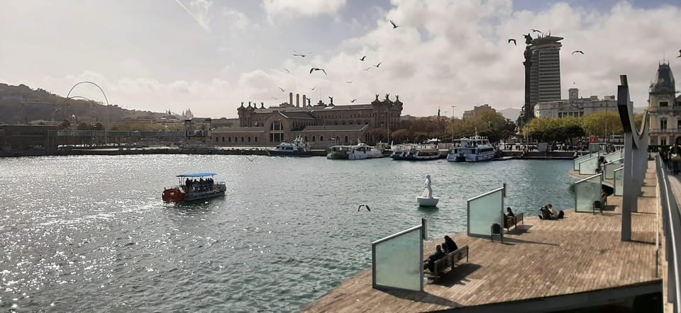 Barcelona: City Views Catamaran Cruise with Music - Entering the cruise from the KBr MAPFRE Photo Center