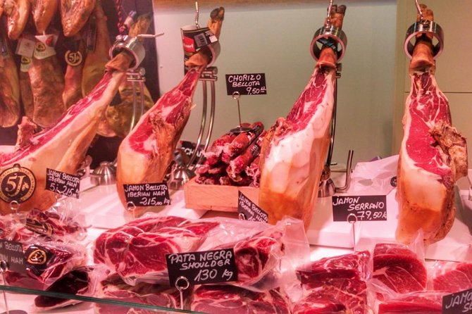 Barcelona Food Tour: Market & Gothic Quarter with Expert Guide - Inside Mercat de la Boqueria: fried fish and cured flavors you can shop for later