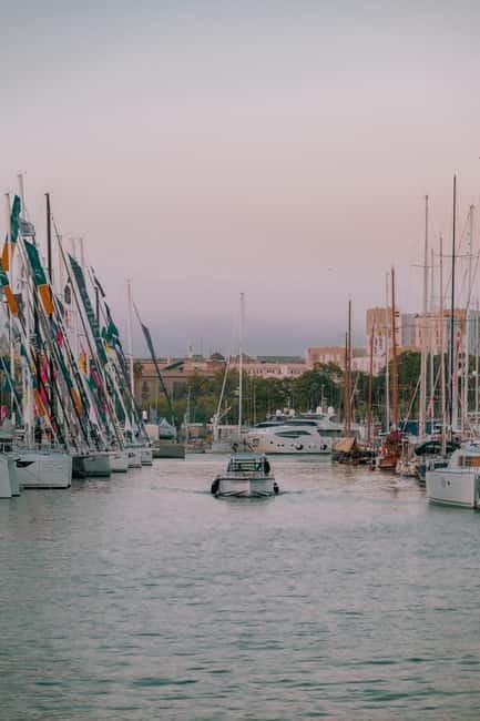 Barcelona from the heights to the sea: Montjuïc, Cable Car, and Beach - Sant Sebastià Beach and the W Hotel promenade: sea air replaces city noise