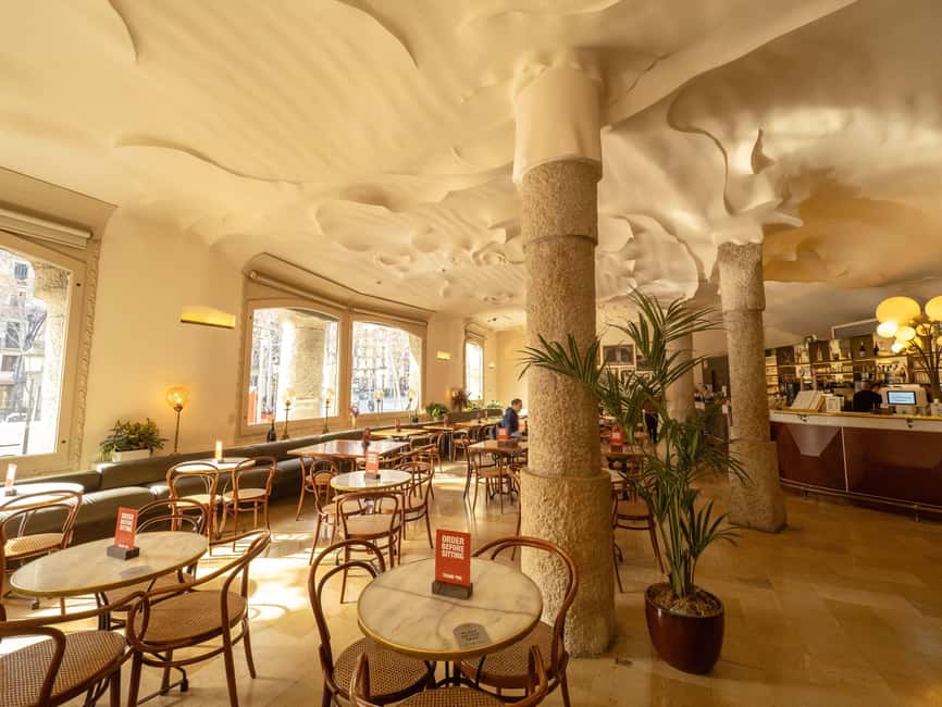 Barcelona: Gaudi Tapas & Wine Tasting Small Group Tour - Casa Milà (La Pedrera) exterior in 15 minutes: undulating stone and sculpted balconies
