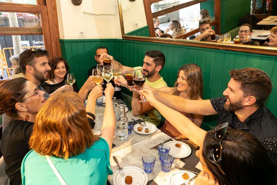 Barcelona: Gaudi Tapas & Wine Tasting Small Group Tour - Casa Batlló exterior in 30 minutes: mosaics, rooflines, and balcony details