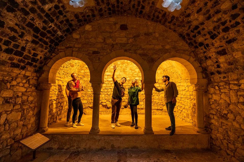 Barcelona: Girona Private Guided Tour by High-Speed Train - Arab Baths stop: atmospheric entry and what happens on Sundays