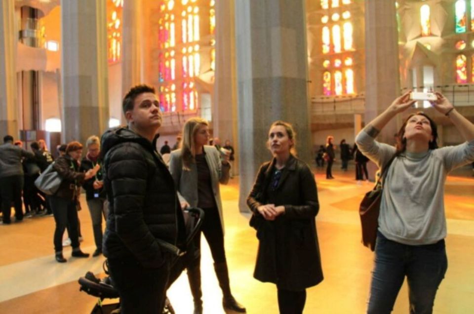 Barcelona: Guided Sagrada Familia Tour & Skip-The-Line Entry - Sagrada Familia interior: stained glass, main altar, and light that changes