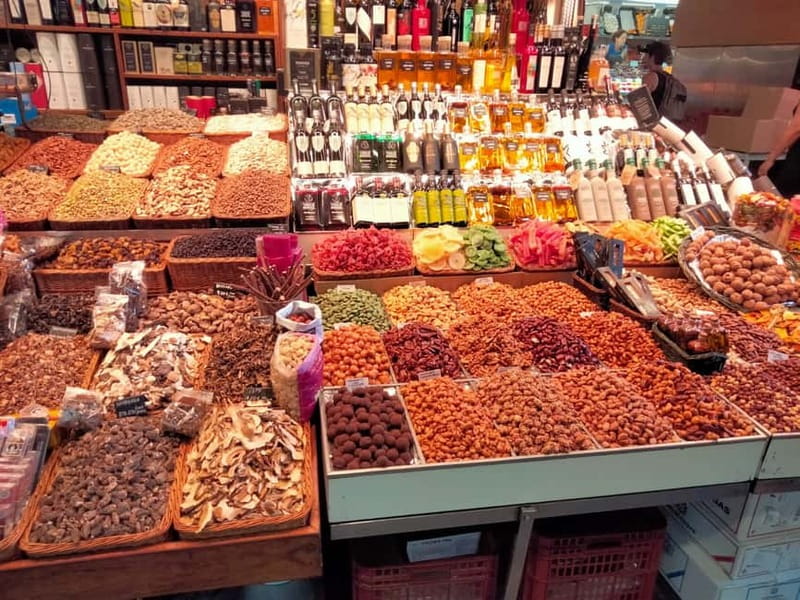 Barcelona: Markets Tour With Food and Wine Tasting Upgrade - The caganer shop stop: learning Catalonia’s strangest tradition