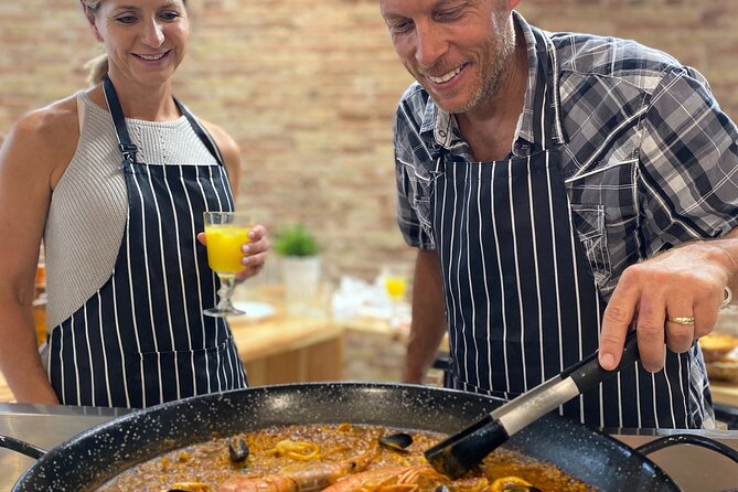 Barcelona Paella Cooking Class & Boqueria & Hofmann-Trained Chefs - Garlic-Rubbed Pan con Tomate and Catalan Tapas in a Restored Studio