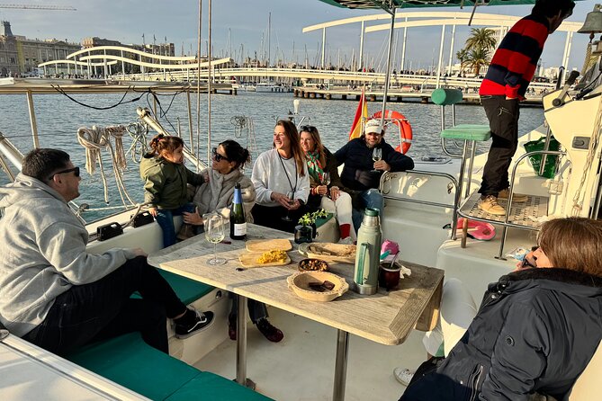 Barcelona Private Catamaran, Snacks and Cava, Sunset Option - Catamaran Comfort: Nets, Cushions, and SUP Boards