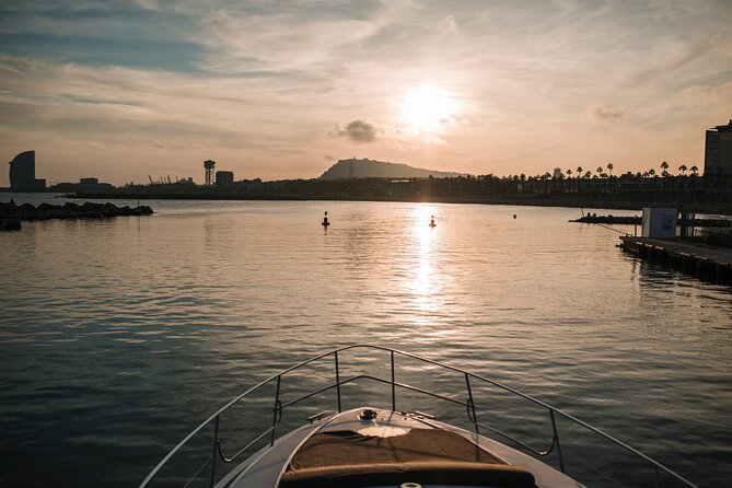 Barcelona Private Luxury Motor Yacht Sunset Cruise with Drinks - Along the coast: Torre Agbar and the skyline from sea level