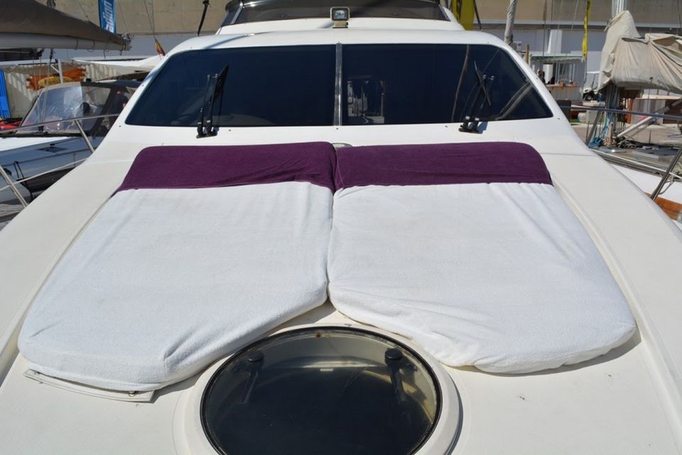 Barcelona: Private Motor Yacht Charter - Swim breaks, sun time, and the onboard drinks that keep it easy