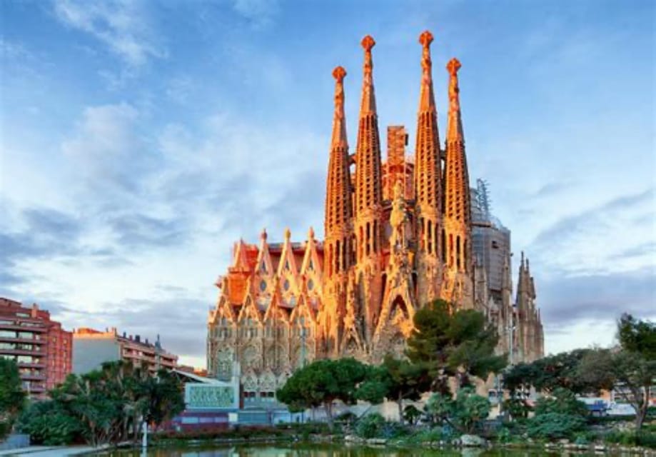 Barcelona: Sagrada Família Guided Tour and Entry Tickets - Outside the Basilica: Art Nouveau Facades and a Church Still Growing