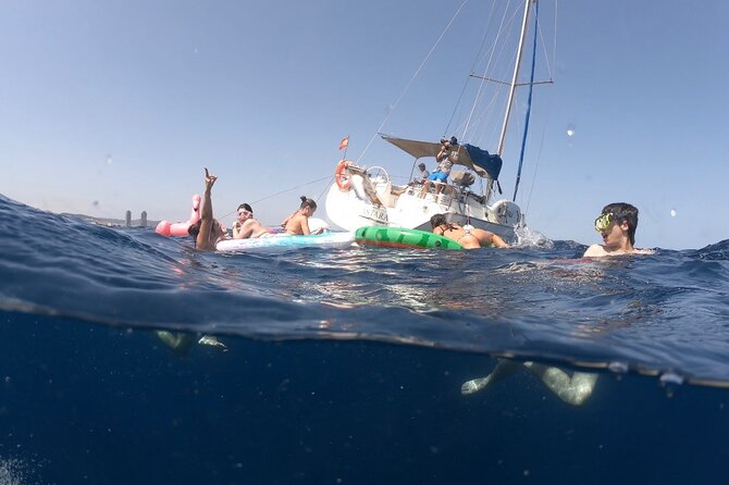 Barcelona Sailing Tour with Swimming, Snacks and Drinks - Past Hotel W and the Port: Skyline Views from Sea Level