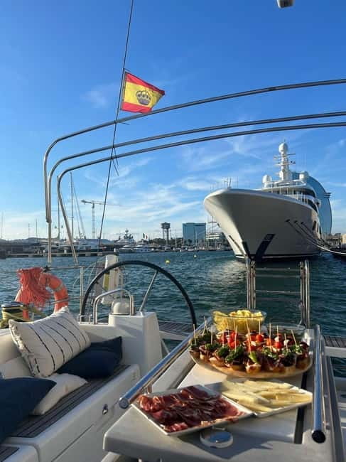 Barcelona: Sailing Tour with Tapas, Drinks and Swim Stop - The Tapas + Drinks Setup: Simple Food, Real Enjoyment
