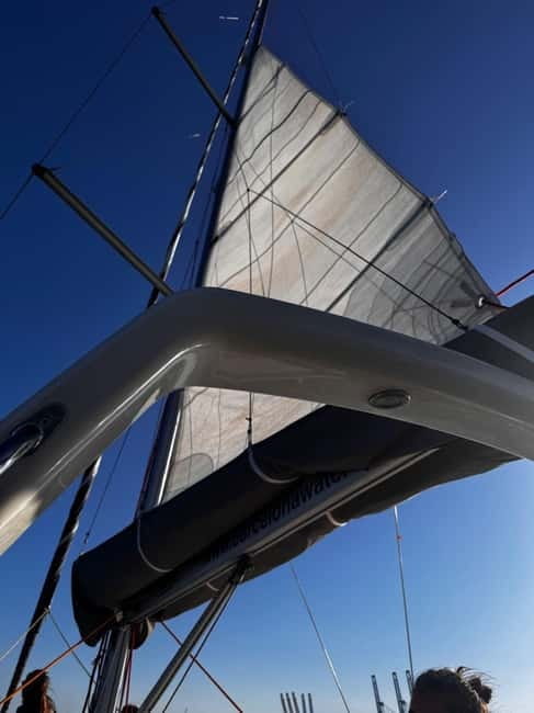 Barcelona: Sailing Tour with Tapas, Drinks and Swim Stop - Sailing Past Barcelona’s Waterfront: Harbor Views and Sights You Can Actually Use