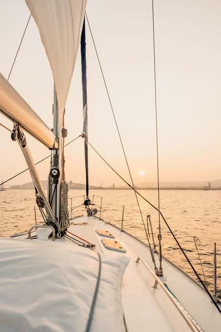 Barcelona: Sailing Tour with Young Local Captain & Drinks - Port Vell: Superyachts, Maremagnum, and a Las Ramblas View from the Water