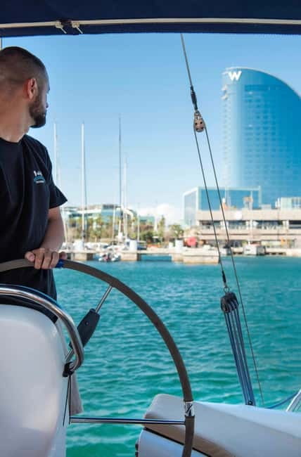 Barcelona: Sailing Tour with Young Local Captain & Drinks - La Barceloneta Stretch: Guided Sightseeing While You Cruise Along the Beach