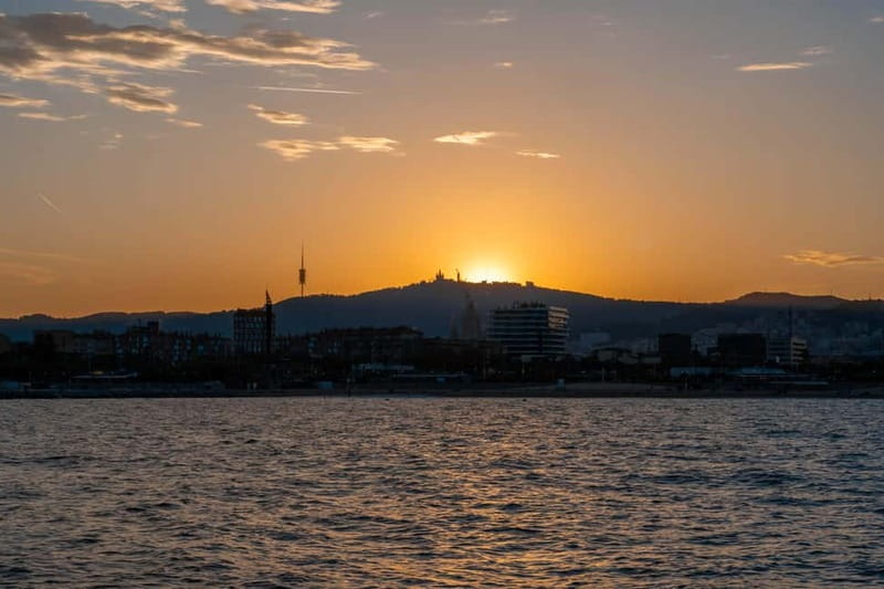 Barcelona: Sunset Catamaran Cruise with Wine and Tapa - Weather reality: what to wear and what can change