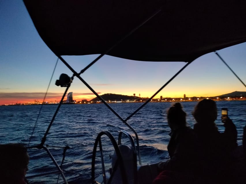 Barcelona: Sunset Cruise with Snacks and Drinks - Port Olímpic Boarding: Find Artimo fast under the two towers