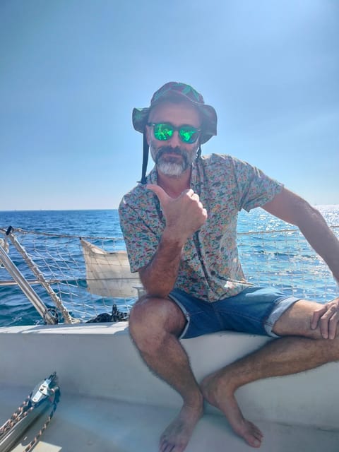 Barcelona: Sunset Cruise with Snacks and Drinks - The water moment: swim if you brought your swimsuit