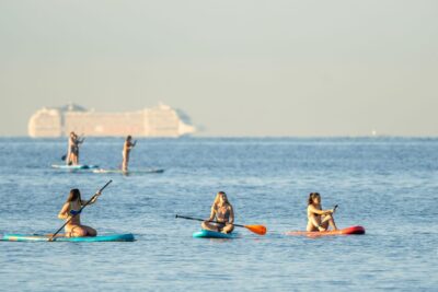 Barcelona: Sunset Paddleboarding Experience with 1 Beer - Meeting at Carrer de Grau i Torras, 23: Easy Start, Real Logistics