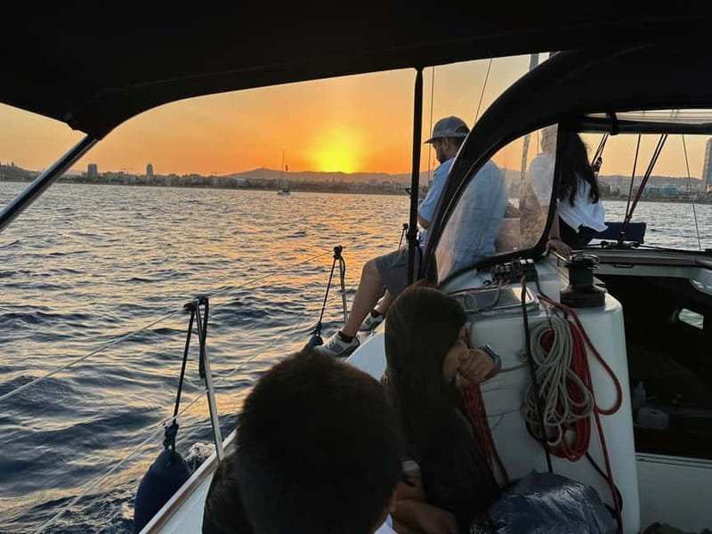Barcelona: Sunset Sailboat Cruise with Open Bar and Snacks - The first stretch out of the port: Olympic Port glide