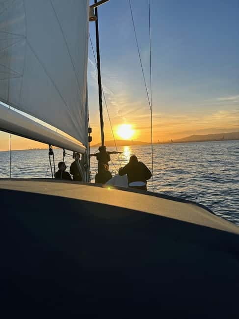 Barcelona: Sunset Sailboat Cruise with Open Bar and Snacks - Onboard vibe: music, snacks, and captains who make it personal