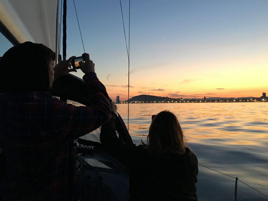 Barcelona: Sunset Sailboat Cruise with Open Bar and Snacks - Landmarks from the water: seeing Barcelona as a waterfront city