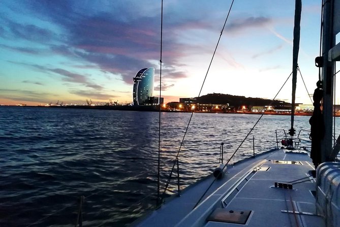Barcelona Sunset Sailing Cruise from Port Olímpic with Open Bar - What Happens First in Port Olímpic: Whale Statue, Golden Plates, and Safe Sailing