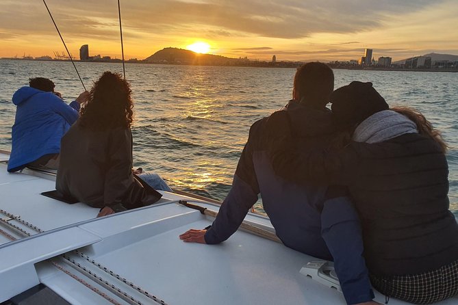 Barcelona Sunset Sailing Cruise from Port Olímpic with Open Bar - Maremagnum on Pontoons: Modern Shopping, Sea-Level Perspective