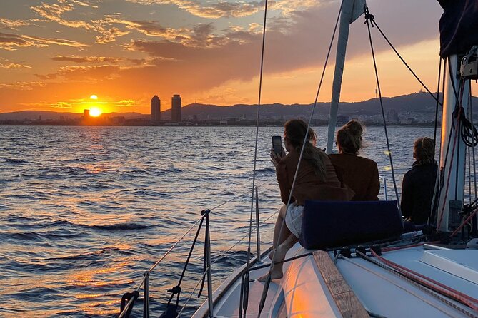 Barcelona Sunset Sailing with Open Bar of Cava and Snacks - Sunset Sailing From Port Olimpic: what the experience feels like
