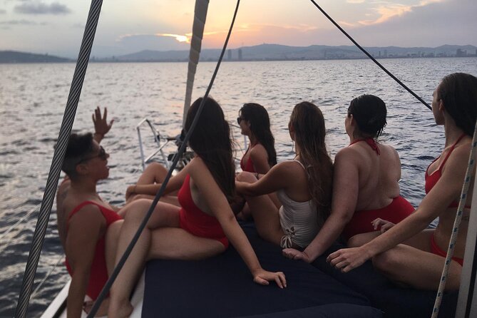 Barcelona Sunset Sailing with Open Bar of Cava and Snacks - Seeing Sagrada Familia from the sea: the one-time photo moment