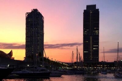 Barcelona Sunset Sailing with Open Bar of Cava and Snacks - Playa de la Barceloneta from the water: the fun 15-minute snapshot