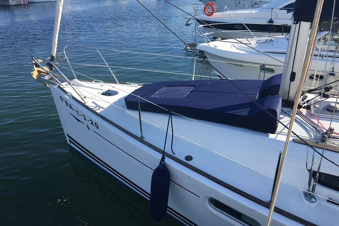 Barcelona Sunset Sailing with Open Bar of Cava and Snacks - Captains and the onboard vibe: why the group size matters