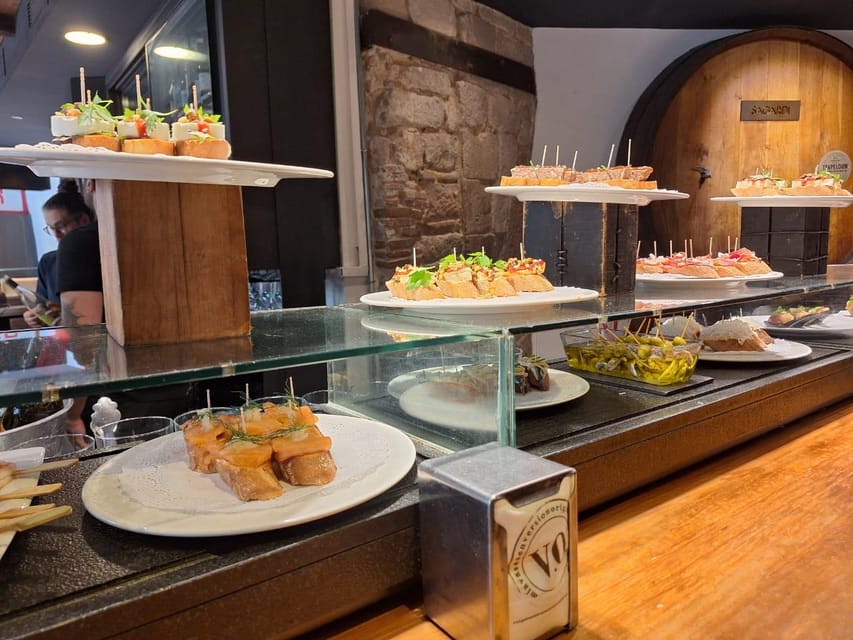Barcelona: Tapas and Pintxos Tour with Crema Catalana - Off-the-crowd Barcelona food, in real local rhythm