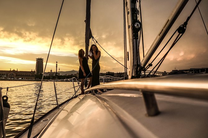 Barcelona Unique Sunset Sailing Experience with Tapas & Open Bar - What’s onboard: tapas, snacks, and the open bar rhythm