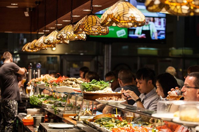 Boqueria & St Caterina Markets with Food & Tapas Small Group Tour - Plaça Reial Meets the Ramblas: The Start That Sets Your Pace