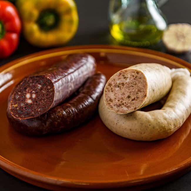 Eat Like a Catalan with a Local Guide - The first tasting stop: settling in with local snacks and wine