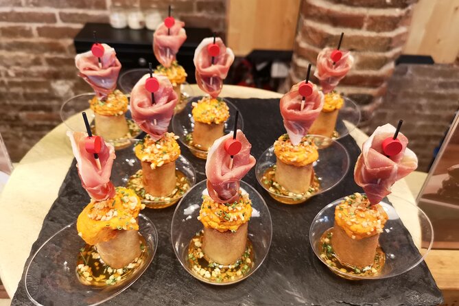 Food & Drink Tasting Private Tour & Sagrada Familia Skip the Line - Mercat de la Boqueria: Iberian ham at Barcelona’s most famous market