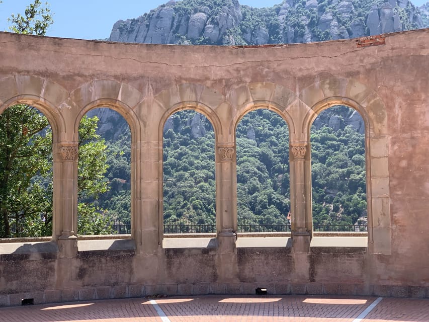 From Barcelona: Half-Day Trip to Montserrat Mountain - Your smooth start: hotel pickup to Montserrat in a Mercedes