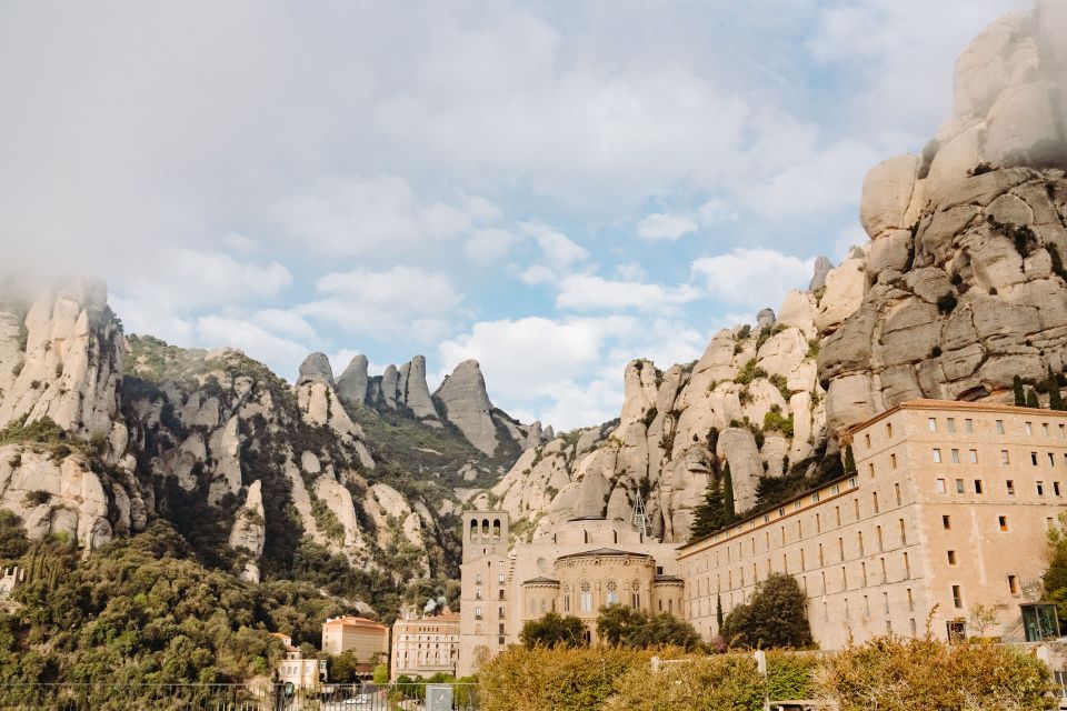 From Barcelona: Montserrat & Cava Winery Day Trip - First stop: meeting point and the early start out of Barcelona