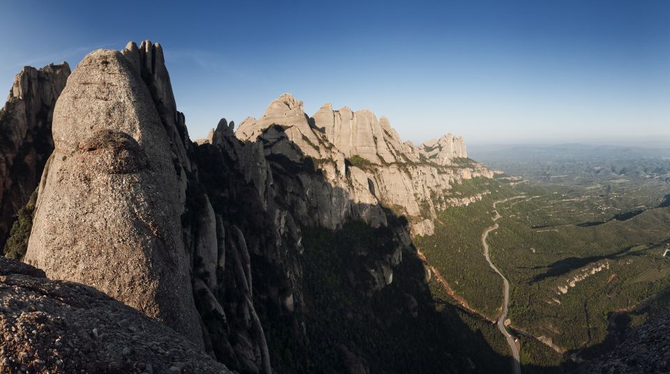 From Barcelona: Montserrat Full-Day Trip with Guided Hike - Santa Maria de Montserrat and La Moreneta: the heart of the day