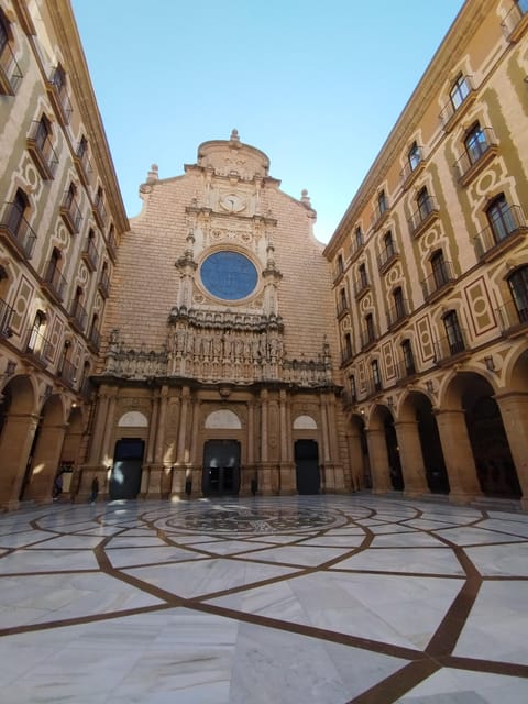From Barcelona: Montserrat Monastery & Hike with Cable Car - Languages and guide style: what you can expect while walking and listening