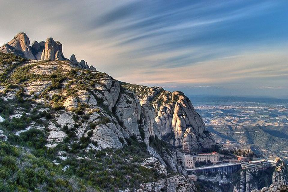 From Barcelona: Montserrat Tour, Rack Railway & Licor Taste - Rack Railway Views: When the Mountain Shows Up Fast