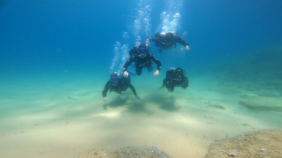 From Barcelona: Tossa de Mar Scuba Diving and 3-Course Meal - Vila Vella, Fortified Walls, and the Lighthouse Walk