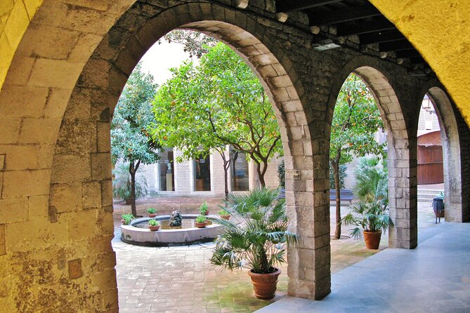 Full-Day Barcelona Tour by Sidecar Motorcycle - Rambla de Catalunya, Plaza de España, and Montjuïc: the city’s big-view finale