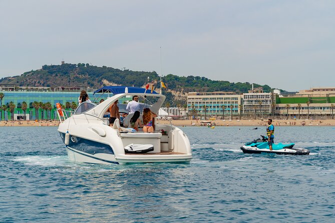 Gobbi Yacht Rental in Barcelona 9 Pax 2/4/8hs - On-Board Comfort: Snacks, Drinks, Music, and a Real Restroom